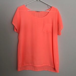 Bright orange top